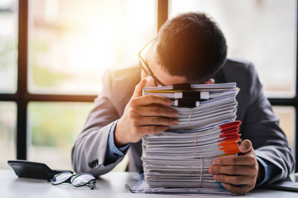 istock business documents businessman check legal document review Prepare documents or analysis reports, tax items, accounting documents, data contracts, office partner agreements. 1410328668