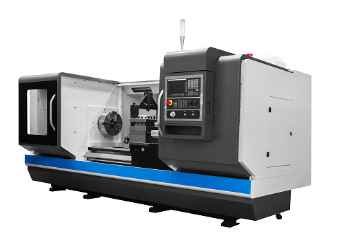 Manufacturing professional lathe machine . Industrial concept. Programmable modern digital lathe with digital program control, turret type blade holder