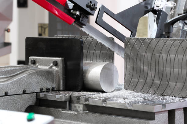 istock Automatic bandsaw sawing metal workpiece, industrial concept 1410328818
