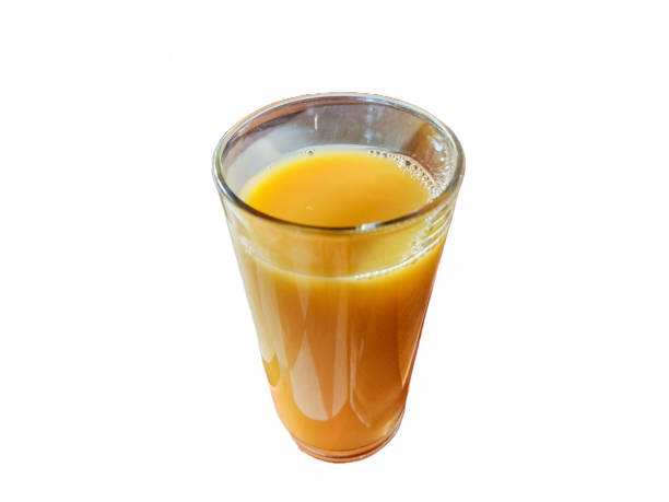 istock orange juice in a glass isolated on white background 1410337619