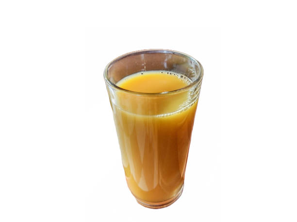 istock orange juice in a glass isolated on white background 1410337882