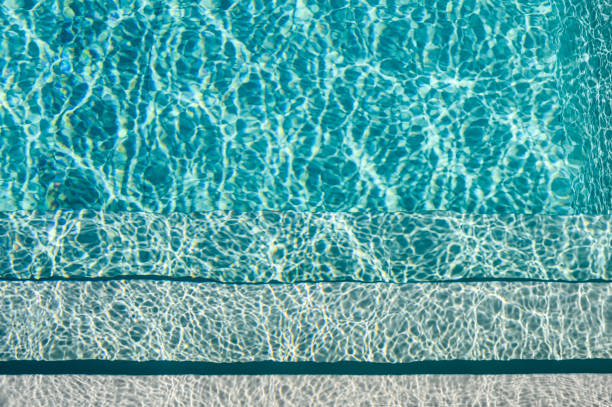 Water in a pool with steps. Background on the theme of water.