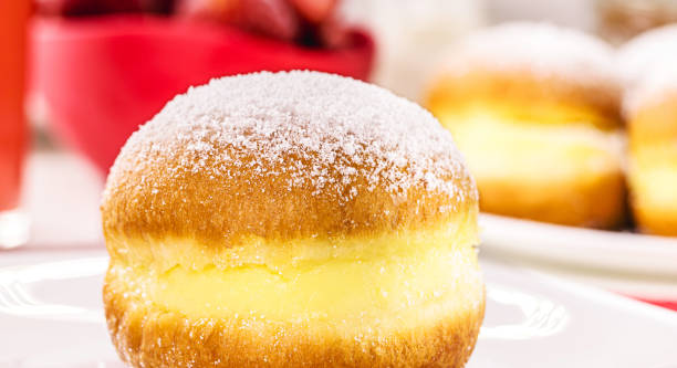 istock sweet bread with sugar cream and egg, called Brazilian fried donut called bakery dream, in germany it is called Berliner Eierlikör or Kreppel-Eierlikör in Germany, 1410344134