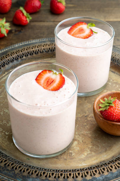 istock Two Glasses of Strawberry Smoothie 1410347205