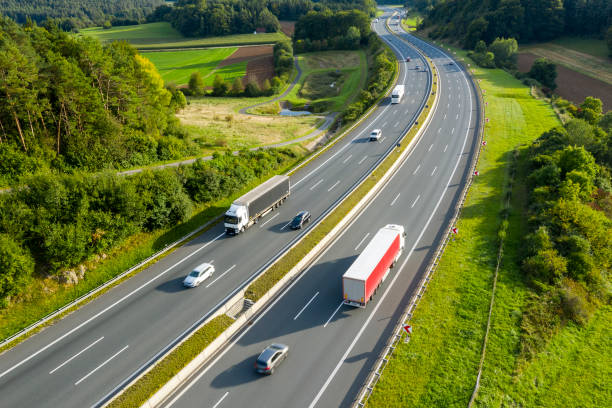 Multiple Lane Highway with Trucks and Cars from Above stock photo