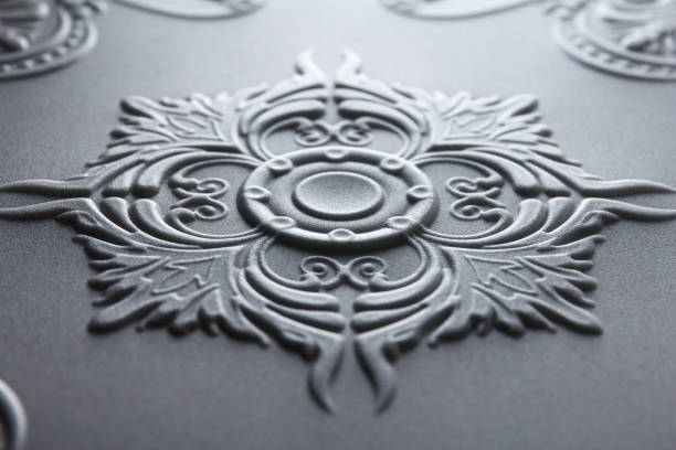 istock A sheet pressed from foam with a beautiful pattern is ready for attachment to the ceiling 1410348554