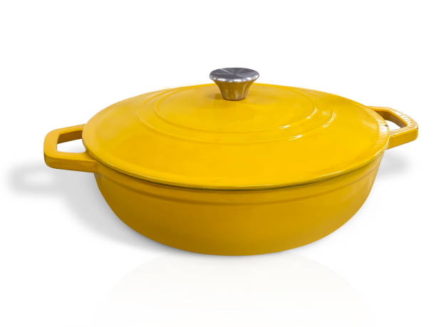 Braising Pan Cast-Iron Braising Pan with clipping path on white background braising pan stock pictures, royalty-free photos & images