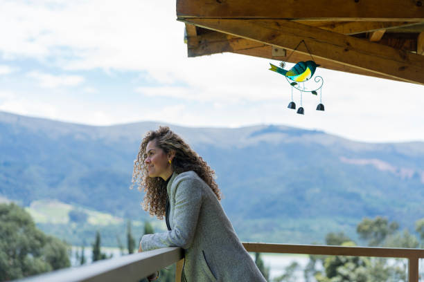 istock Beautiful woman meditating in solitude on her vacation while on vacation 1410352756