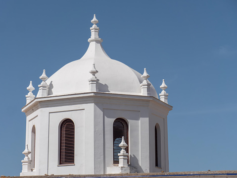 Dome of the white building on Caleta beach in Cadiz, Andalusia