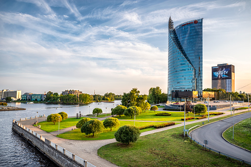 Riga, Latvia - August 7, 2019: Kipsala Island with Sun Stone Skyscraper in the West Bank of Daugava (Pardaugava) - Riga, Latvia