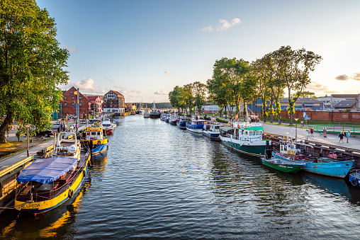 Klaipeda, Lithuania - August 08, 2019: Sunset in the Klaipeda port canal in a beautiful summer day, Lithuania