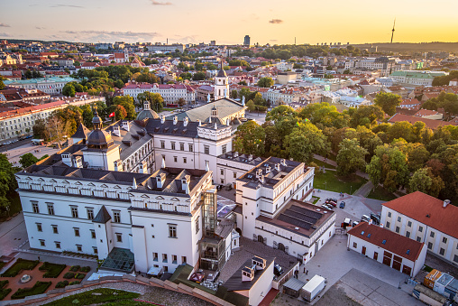 Aerial view from the Gediminas Tower on Vilnius city center with Cathedral Basilica of St Stanislaus, Palace of the Grand Dukes and TV tower at sunset. Lithuania