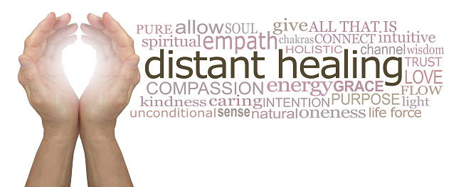female cupped hands with bright white light between beside a DISTANT HEALING word cloud against a white background