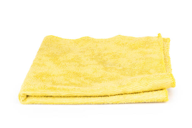 istock rag color yellow isolated on white background dirty old 1410356554
