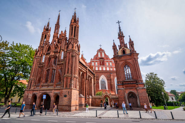 Vilnius, Lithuania - August 10, 2019: The St. Anne's Church and Bernadines Church with the monastery are a fine Lithuanian Gothic ensemble located just next to each other.