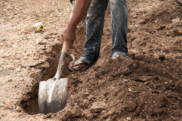 istock man digging in the ground with a shovel 1410358572