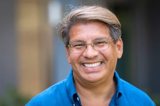 istock Smiling gay mature man looking at the camera 1410360139