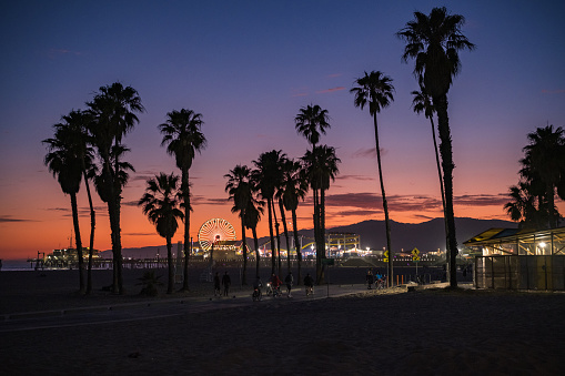 Los Angeles, USA - May 14th, 2022: The famous Santa Monica beach at sunset.