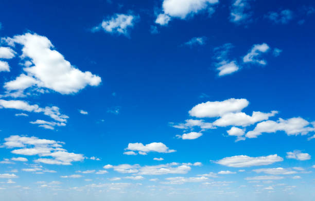 istock Blue sky background with tiny clouds. fluffy clouds in the sky. Background summer sky 1410381684