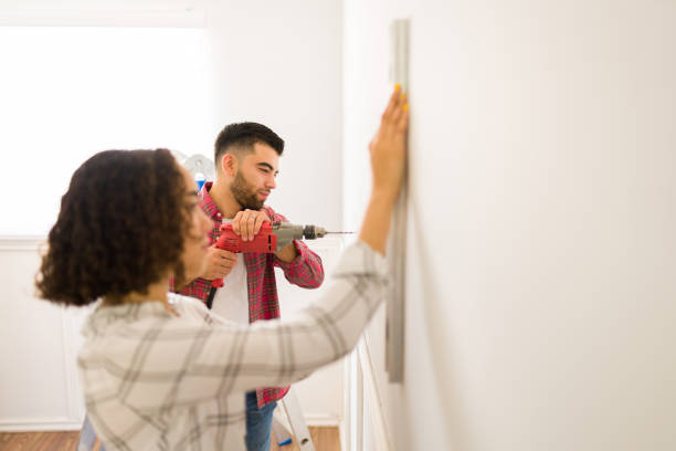 istock Caucasian couple doing home improvements together 1410382671