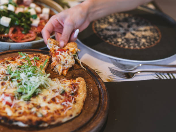 istock fresh talian pizza in a restaurant 1410387440