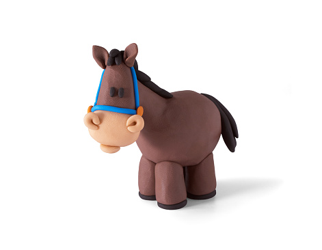 Cute modeling clay horse isolated on white background. Horse made of brown plasticine. 3d artwork