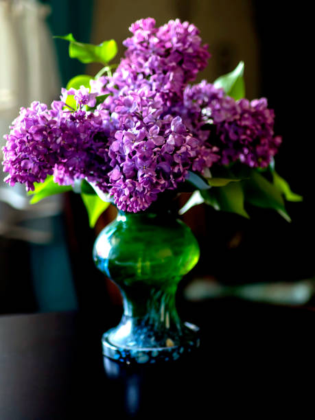 istock bright bouquet of lilacs in a vase 1410388518