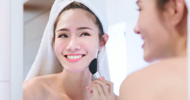 istock woman in front of mirror 1410390042
