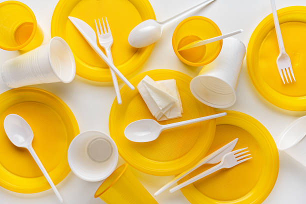 istock A set of a variety of disposable plastic tableware utensils. 1410392206