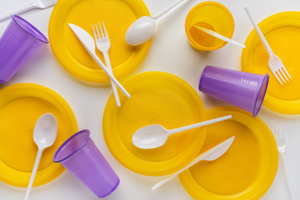 istock A set of a variety of disposable plastic tableware utensils. 1410392208