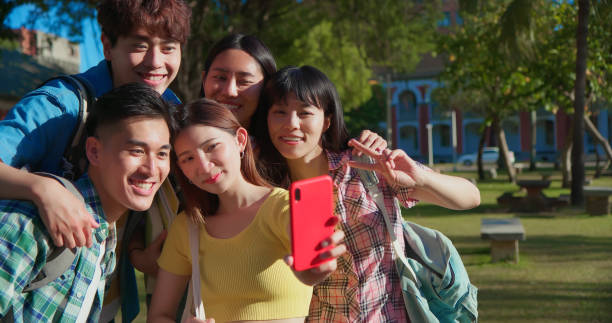 istock young asian people take selfie 1410392294