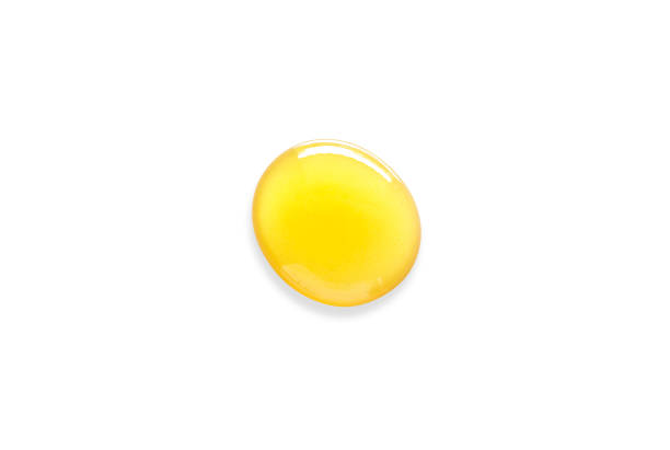 istock Honey drop isolated on white.File contains clipping path. 1410395609