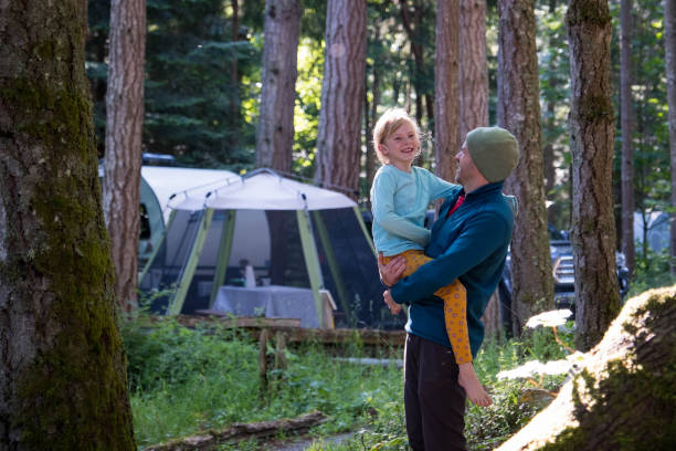 istock Father on a camping adventure with his daughter 1410399144