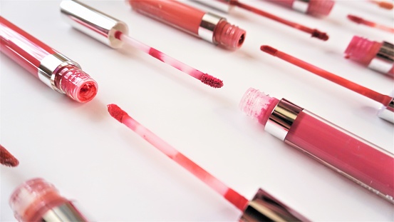 Liquid lipstick artistic display layout on white background