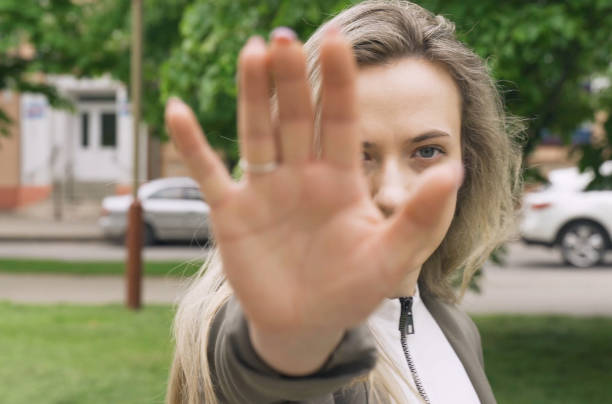 istock Young woman shows no gesture with hands. 1410403335