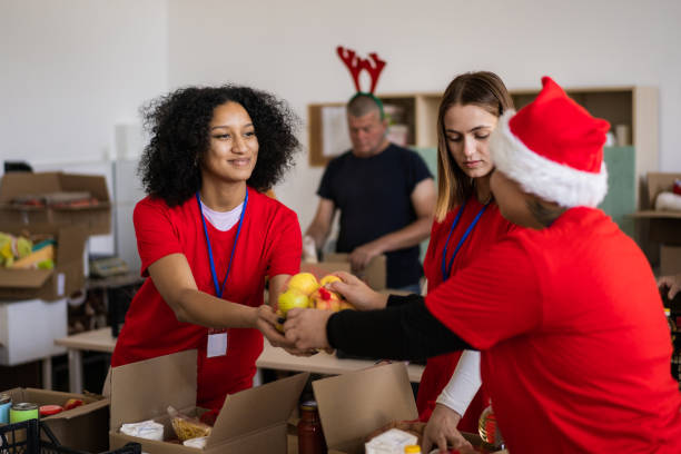 istock Small multi-ethnic group of people working on humanitarian aid project 1410409258