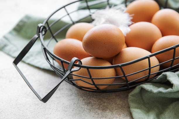 istock Basket of fresh brown eggs 1410411896