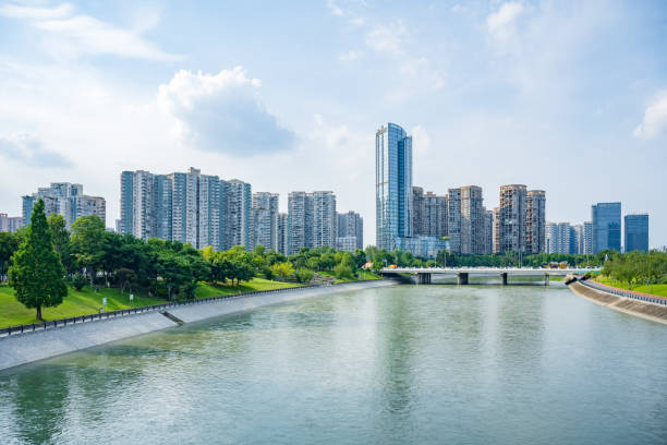 istock Sunny riverside bridge and Financial City 1410414836