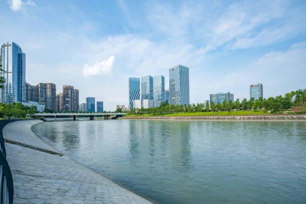 istock Sunny riverside bridge and Financial City 1410415073