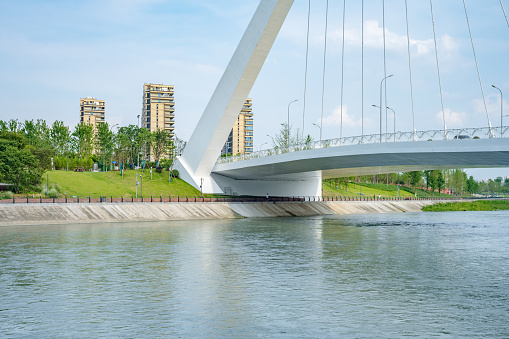 Sunny riverside bridge and Financial City