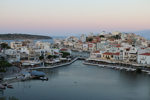 A picturesque Greek town in Crete by the sea at sunset