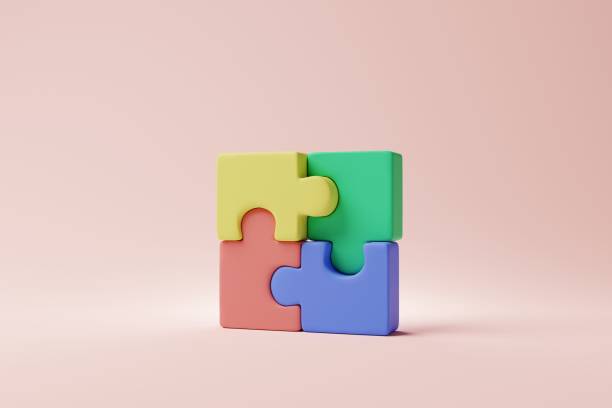 istock Colored puzzle jigsaw cube model on pink background. Teamwork, Business group concept. 3d rendering 1410416150