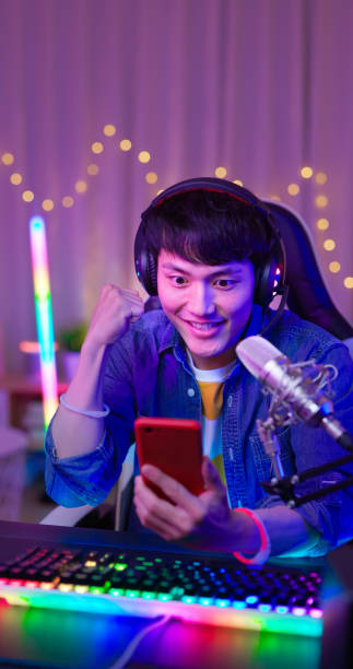 istock esport streamer plays mobile game 1410418263