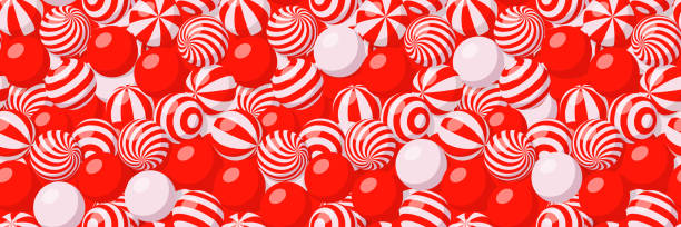 Seamless pattern with many white and red candies Christmas background with many round candies with white and red spiral and striped pattern. Vector cartoon seamless pattern with pile of sweet dragee, beach balls, bubble gum or gumballs peppermints stock illustrations