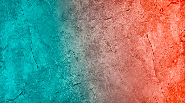 istock Dark orange blue green teal abstract background. Gradient. Toned rough stone surface with cracks. Close-up. 1410420106