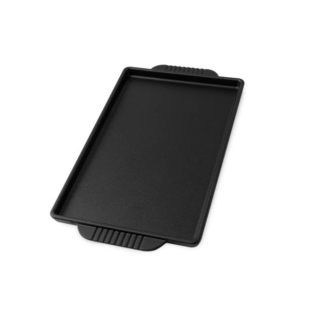 istock Iron cast grill pan isolated on white background with clipping path 1410420272
