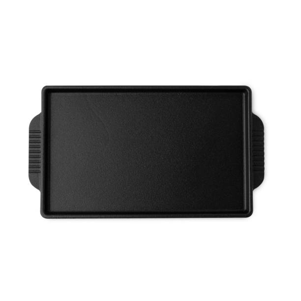 istock Iron cast grill pan isolated on white background with clipping path 1410420273