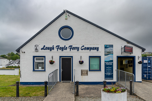 Greencastle, Ireland - 9 July, 2022: view of the Lough Foyle Ferry Company building and headquarters in Greencastle