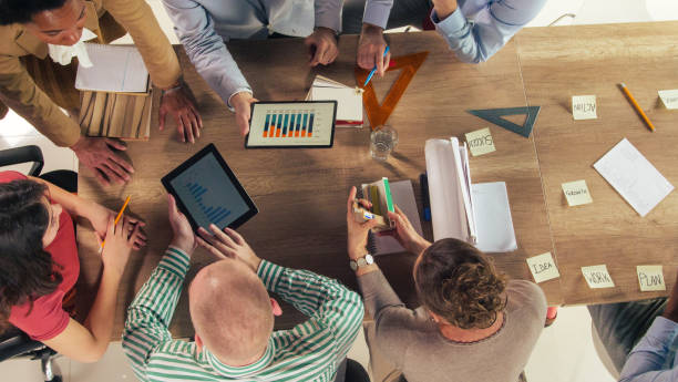istock Creative entrepreneurs having a meeting, discussing data and strategies 1410424989