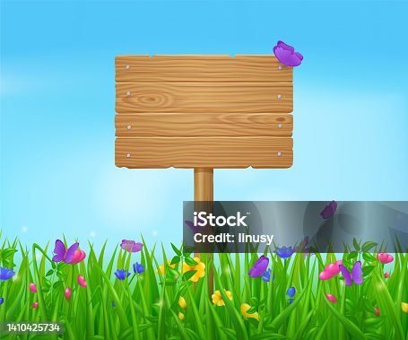 istock Wooden signboard on summer meadow 1410425734